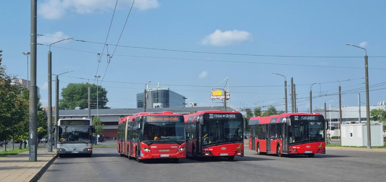 Vilnius, Solaris Urbino IV 12 No. 3111; Vilnius, Scania Citywide LFA No. V8029; Vilnius, Volvo 7700 No. 784